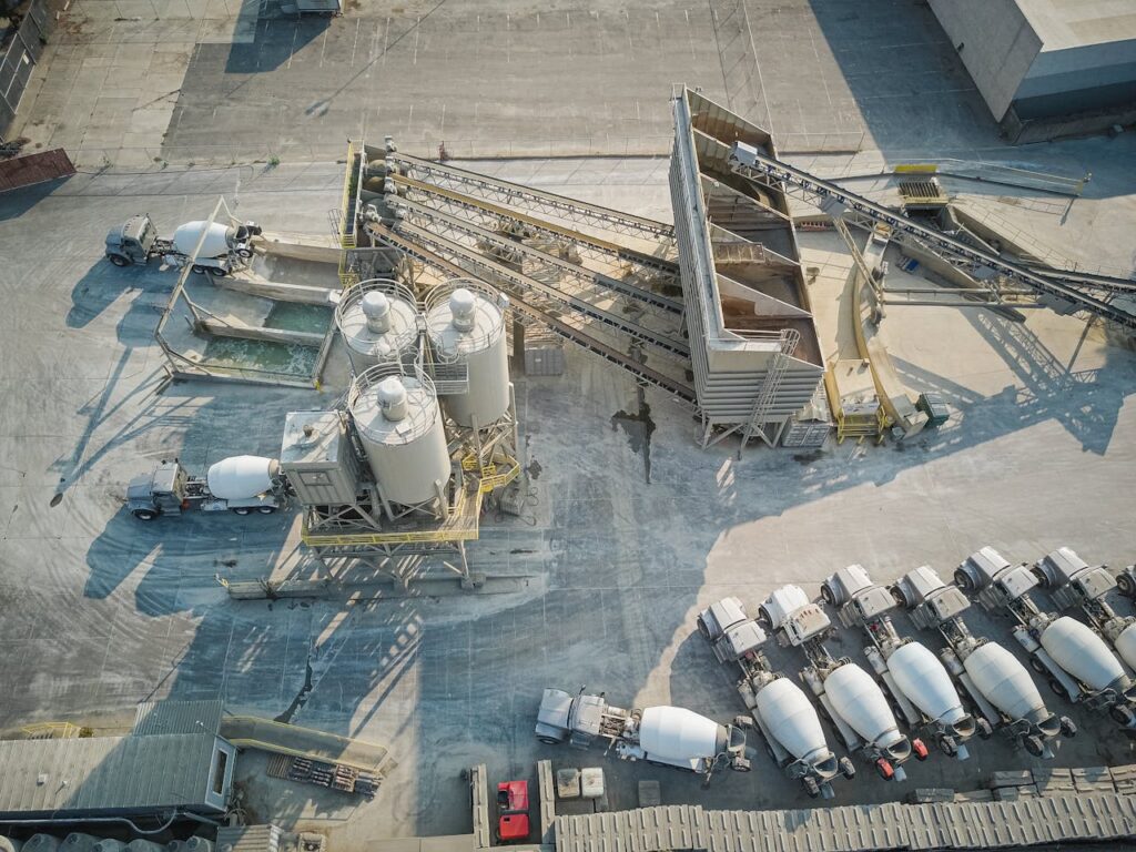 White and Gray Robot on Gray Concrete Floor